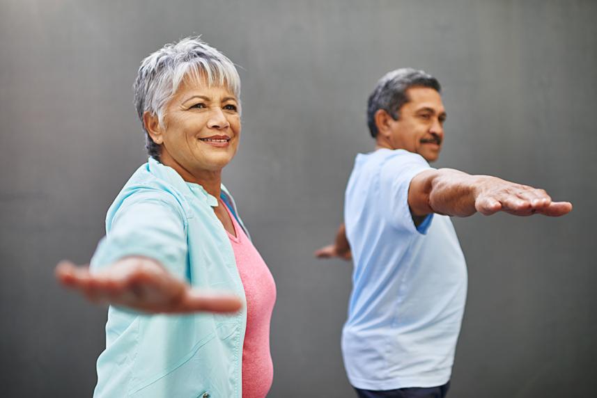 People doing yoga exercises