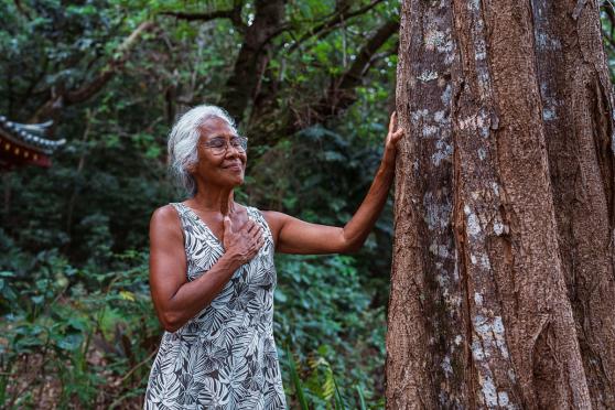 Woman breathing outside.
